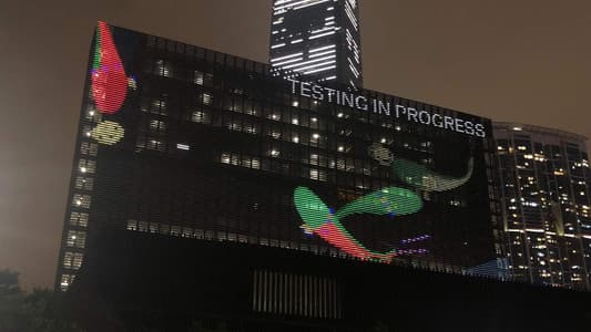 Screenshot of Close look at M+ facade showing Touch for Luck in testing mode